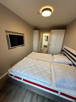 Schlafzimmer mit Schränken - Wohnung Nr. 203 ZingstOase - Top-Hundeurlaub