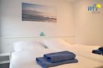 Schlafzimmer - Ferienwohnung Inseltraum - Top-Hundeurlaub
