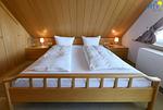 Schlafzimmer - Ferienwohnung Karin's Nest - Top-Hundeurlaub