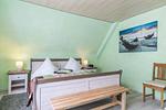 Haus Blomberg, Schlafzimmer 2 - Ferienhaus Blomberg Büsum - Top-Hundeurlaub