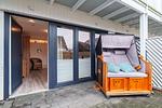 Appartementhaus Meeresbucht Whg. 2, Terrasse mit Strandkorb - Ferienwohnung Appartementhaus Meeresbucht Whg. 2 - Top-Hundeurlaub