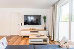 Bahnhofstraße 9, Sandbank 2, Wohnzimmer - Ferienwohnung Bahnhofstraße 9, Sandbank 2 - Top-Hundeurlaub