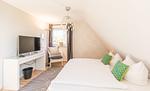 Schlafzimmer 1 - Ferienhaus Wassermann 21b - Top-Hundeurlaub