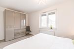 Bahnhofstraße 9, Büsumer Perlenherz, Schlafzimmer 2 - Ferienwohnung Perlenherz Büsum – zentral, modern & mit Balkon - Top-Hundeurlaub