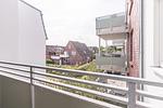Bahnhofstraße 9, Büsumer Perlenherz, Balkon - Ferienwohnung Perlenherz Büsum – zentral, modern & mit Balkon - Top-Hundeurlaub