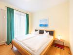 Schlafzimmer - Ferienwohnung mit 1 Schlafzimmer und Balkon (D121) - Top-Hundeurlaub