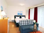 Wohnzimmer - 1-Raum-Ferienwohnung mit Terrasse (DG23) - Top-Hundeurlaub