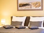 Schlafzimmer - Ferienwohnung mit 1 Schlafzimmer und Balkon (D224) - Top-Hundeurlaub