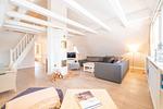 Das große, offene Wohnzimmer befindet sich im 1. OG. - Landhaus Windspiel - Top-Hundeurlaub