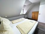 Schlafzimmer - Ferienwohnung Hauke-Haien im Reetdachhaus Bongsiel - Top-Hundeurlaub
