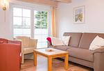 Wohnzimmer in Süddorf in der der Wohnung Sonnendeck - Sonnendeck - Hüs in Lee - Top-Hundeurlaub