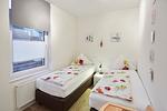 Schlafzimmer - Villa Pirola - Ferienwohnung 4 - Top-Hundeurlaub