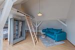 Ferienhaus Wiesenquartier Penkow Schlafzimmer mit Couch - WiesenQuartier - Top-Hundeurlaub