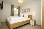 Schlafzimmer - FeWo15-3: strandnah,Terrasse,Sauna,Pool - Top-Hundeurlaub