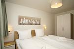 Schlafzimmer - FeWo15-3: strandnah,Terrasse,Sauna,Pool - Top-Hundeurlaub