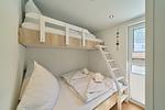 Schlafzimmer - Ferienhaus Strandgeflüster (140) - Top-Hundeurlaub