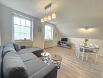 Wohnzimmer - Ferienwohnung Düne 1 Norddeich - Top-Hundeurlaub