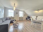 Wohnzimmer - Ferienwohnung Düne 1 Norddeich - Top-Hundeurlaub