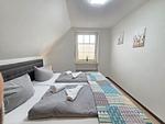 Schlafzimmer - Ferienwohnung Düne 1 Norddeich - Top-Hundeurlaub