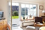 Wohnzimmer - Haus Sylti App. 1 - Top-Hundeurlaub