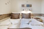 Schlafzimmer - Haus Sylti App. 1 - Top-Hundeurlaub