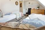 Schlafzimmer - Haus Sylti App. 3 - Top-Hundeurlaub