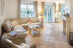 Wohnzimmer - Haus Aurora - Top-Hundeurlaub