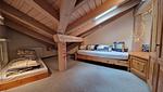 Schlafzimmer in der Dachschräge unterer Stock - 6½-Zimmerwohnung - Top-Hundeurlaub