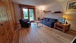 Wohnzimmer mit Fernseher - 2½-Zimmerwohnung - Top-Hundeurlaub