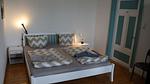 Schlafzimmer - Ferienwohnung Alte Grundschule Berdum 1 - Top-Hundeurlaub