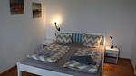 Schlafzimmer - Ferienwohnung Alte Grundschule Berdum 1 - Top-Hundeurlaub