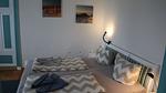 Schlafzimmer - Ferienwohnung Alte Grundschule Berdum 1 - Top-Hundeurlaub