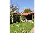 Gartenblick - Ferienhaus Dünenwind - Top-Hundeurlaub