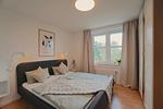 Schlafzimmer - Helle und moderne Ferienwohnung 'Südstrand Apartment' mit Balkon, direkt an der Ostsee - Top-Hundeurlaub