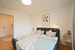 Schlafzimmer - Helle und moderne Ferienwohnung 'Südstrand Apartment' mit Balkon, direkt an der Ostsee - Top-Hundeurlaub