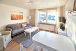 Wohnzimmer - Brise 5 am Wittensee – ebenerdige Ferienwohnung mit Terrasse & Spielscheune - Top-Hundeurlaub