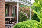 Terrasse - Ferienwohnung „Waterkant“ am Wittensee – viel Platz, Garten und Spielscheune - Top-Hundeurlaub