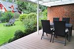 Terrasse - Ferienwohnung „Waterkant“ am Wittensee – viel Platz, Garten und Spielscheune - Top-Hundeurlaub