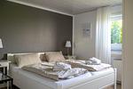 Schlafzimmer - Haus Pusteblume Wohnung 4 - Top-Hundeurlaub