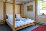 Schlafzimmer - Haus Pusteblume Wohnung 1 - Top-Hundeurlaub