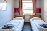 Schlafzimmer - Haus Pusteblume Wohnung 1 - Top-Hundeurlaub