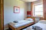 Schlafzimmer - Haus Pusteblume Wohnung 1 - Top-Hundeurlaub