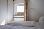Schlafzimmer - Haus Pusteblume Wohnung 3 - Top-Hundeurlaub
