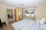 Schlafzimmer - Ferienwohnung Hummer - Top-Hundeurlaub