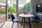Bequemer Essplatz mit Blick in den Garten - Ferienwohnung 1 (DH01) - Top-Hundeurlaub