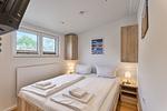 Schlafzimmer - Ferienhaus Küstenklang (139) - Top-Hundeurlaub