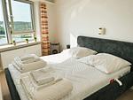 Schlafzimmer - Ferienwohnung Wikinger Nest 13.10 im Wikingturm - Top-Hundeurlaub