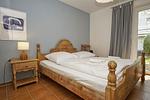 Schlafzimmer - FeWo Boddenkoje: Terrasse - Top-Hundeurlaub