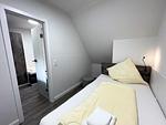 Schlafzimmer - Ferienwohnung Herrenkoog im Reetdachhaus Bongsiel - Top-Hundeurlaub