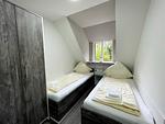 Schlafzimmer - Ferienwohnung Herrenkoog im Reetdachhaus Bongsiel - Top-Hundeurlaub